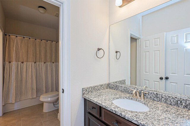 10018 Durango Path Ln, Cypress, TX 77433 - full bath featuring tile patterned flooring, toilet, vanity, and shower / tub combo with curtain