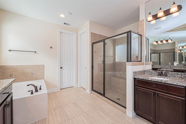 10018 Durango Path Ln, Cypress, TX 77433 - full bathroom with vanity, visible vents, and a stall shower