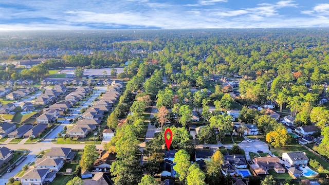 birds eye view of property with a residential view