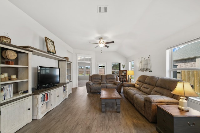 living area featuring visible vents, dark wood-style floors, ceiling fan, and vaulted ceiling