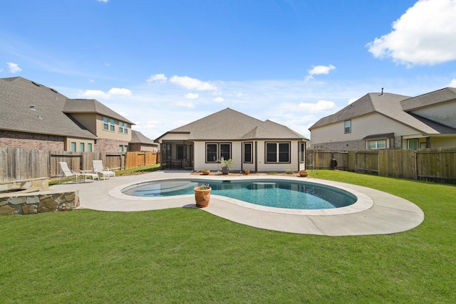 view of swimming pool with a patio, a yard, a fenced backyard, and a fenced in pool