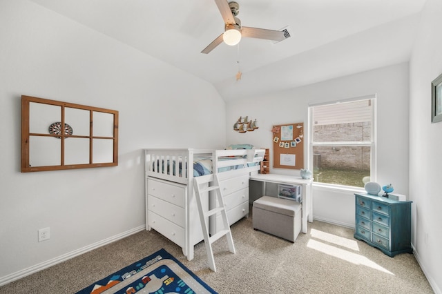 bedroom featuring carpet flooring, ceiling fan, baseboards, and lofted ceiling