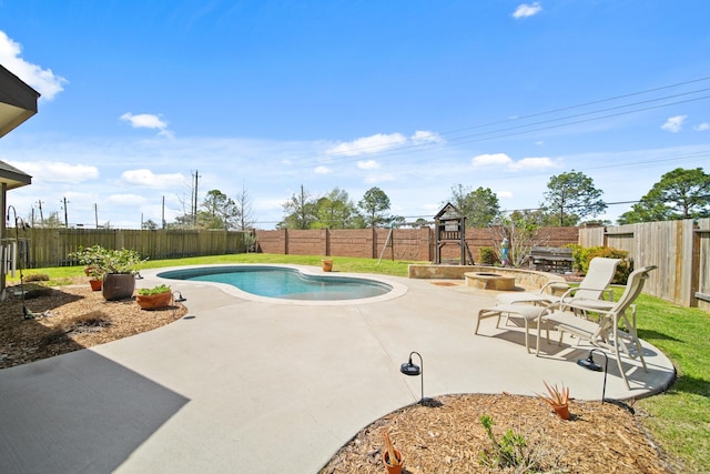 view of swimming pool with a patio area, a fenced in pool, and a fenced backyard