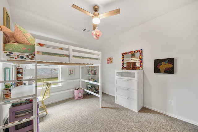 bedroom with visible vents, baseboards, carpet flooring, and vaulted ceiling