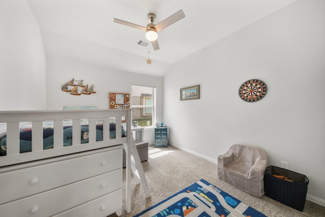 carpeted bedroom with visible vents, ceiling fan, baseboards, and lofted ceiling