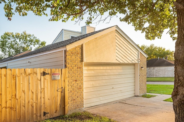 detached garage with fence