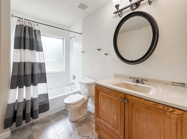 bathroom featuring visible vents, baseboards, toilet, shower / bath combo, and vanity