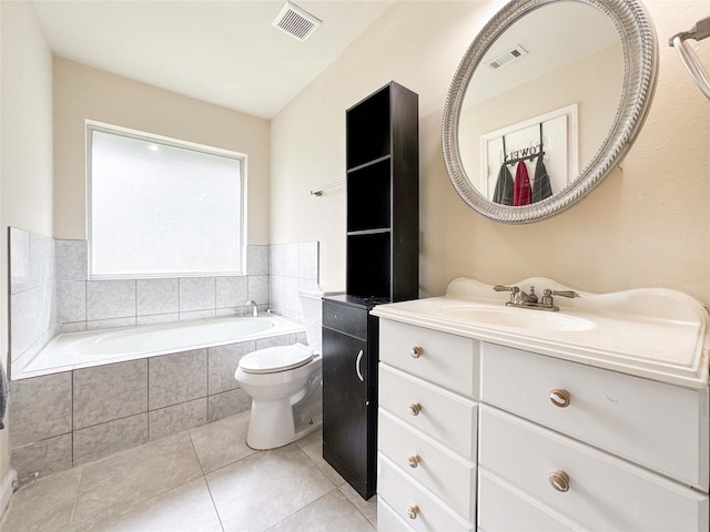 full bath with tile patterned flooring, visible vents, vanity, and a garden tub