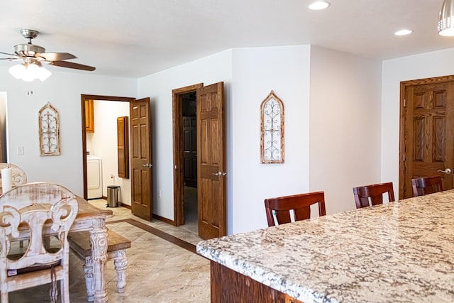 dining area featuring recessed lighting, baseboards, washer / clothes dryer, and a ceiling fan