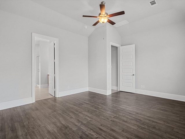 unfurnished room with visible vents, baseboards, lofted ceiling, wood finished floors, and a ceiling fan