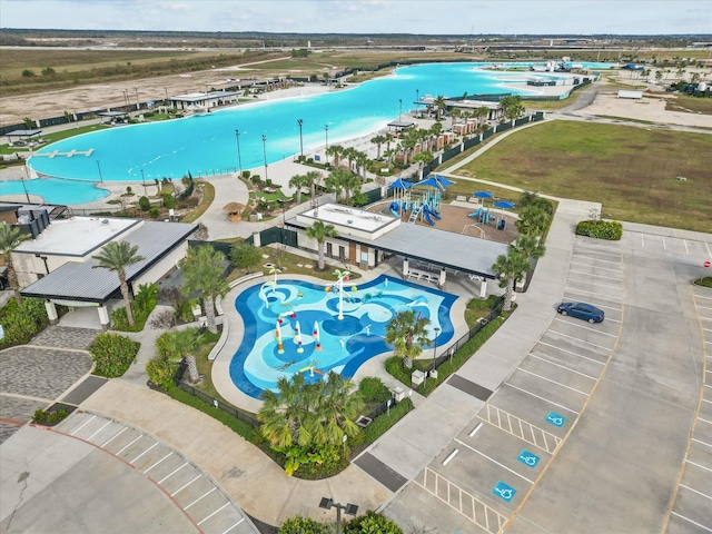 birds eye view of property featuring a water view