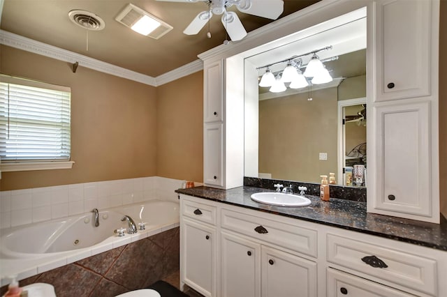 full bath featuring visible vents, ceiling fan, ornamental molding, a tub with jets, and vanity