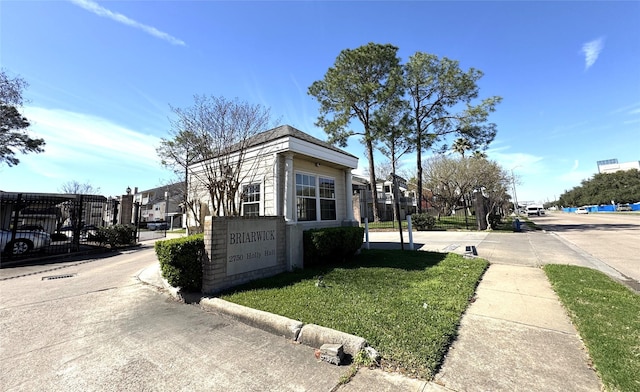 view of property exterior with fence