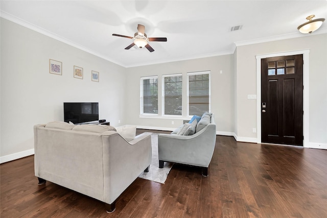 living area featuring visible vents, baseboards, dark wood-type flooring, and ornamental molding