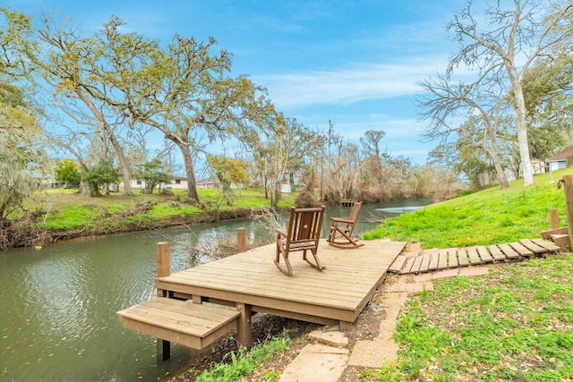 dock area featuring a water view