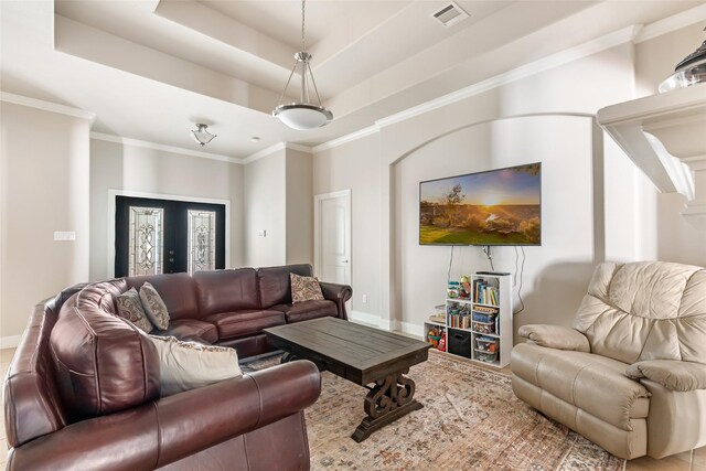 21971 Blazing Trl, New Caney, TX 77357 - living room with baseboards, ornamental molding, visible vents, and a raised ceiling