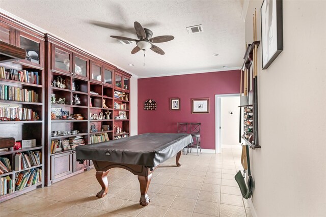 game room with visible vents, pool table, ceiling fan, light tile patterned floors, and a textured ceiling