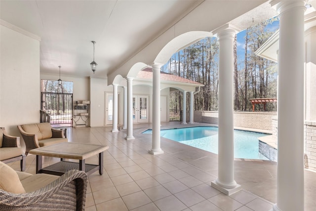 21971 Blazing Trl, New Caney, TX 77357 - outdoor pool featuring french doors and a patio area