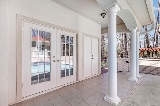 21971 Blazing Trl, New Caney, TX 77357 - view of patio featuring french doors
