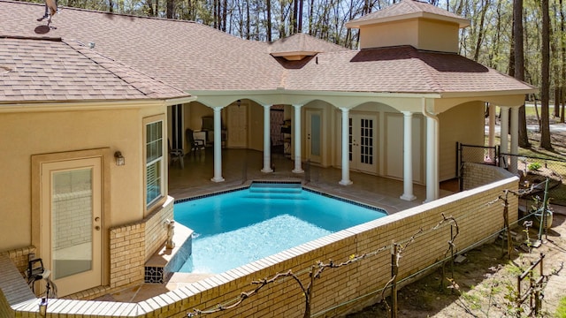 21971 Blazing Trl, New Caney, TX 77357 - outdoor pool with a patio area