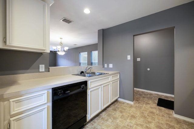 kitchen with dishwasher, light countertops, white cabinets, and a sink