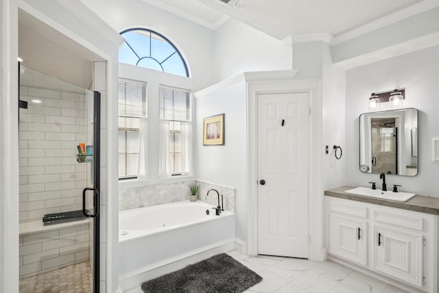 bathroom with ornamental molding, a stall shower, a bath, marble finish floor, and vanity