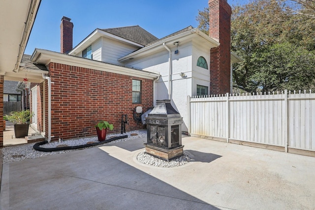 view of patio / terrace with fence