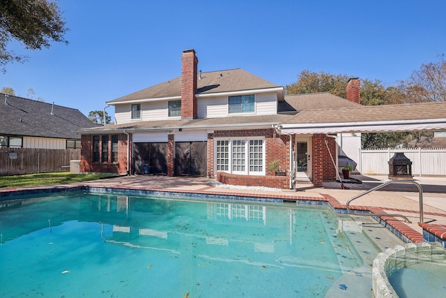 view of pool featuring a fenced backyard, a fenced in pool, and a patio