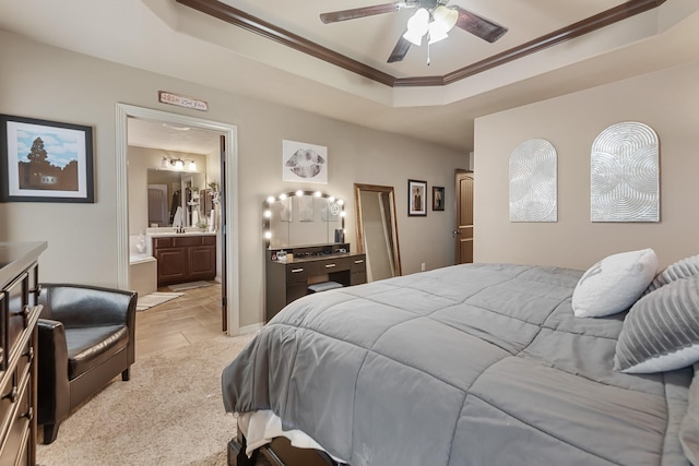 3822 Dove Hollow Ln, College Station, TX 77845 - bedroom featuring a ceiling fan, ensuite bathroom, a tray ceiling, and ornamental molding