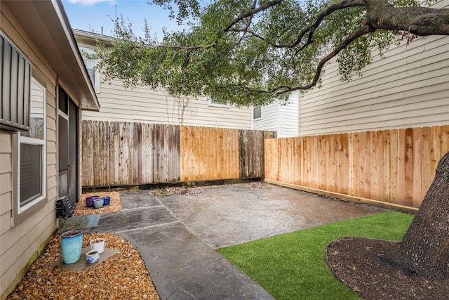 view of patio featuring a fenced backyard