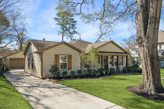 single story home with roof with shingles, covered porch, and a front yard