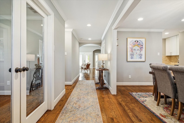 hallway featuring recessed lighting, baseboards, and wood finished floors