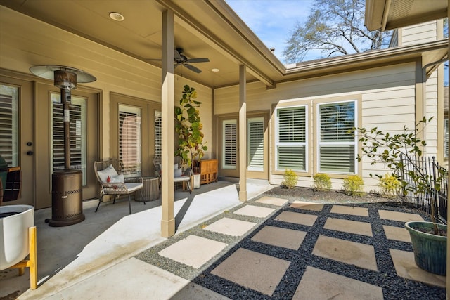 view of patio featuring a ceiling fan