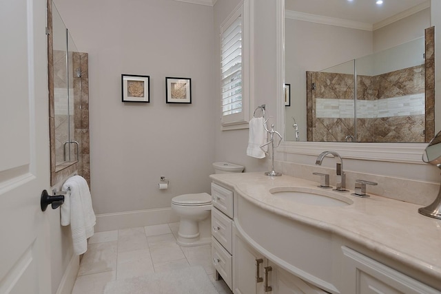 bathroom with vanity, baseboards, a stall shower, ornamental molding, and toilet