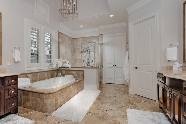 full bath featuring ornamental molding, recessed lighting, tiled shower, a bath, and vanity