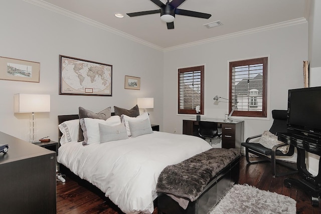 bedroom featuring visible vents, dark wood-type flooring, and crown molding