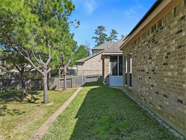 view of yard with fence