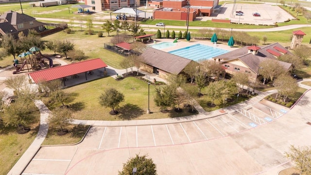 birds eye view of property with a residential view