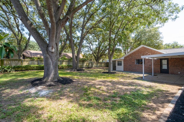 view of yard with a patio area and fence