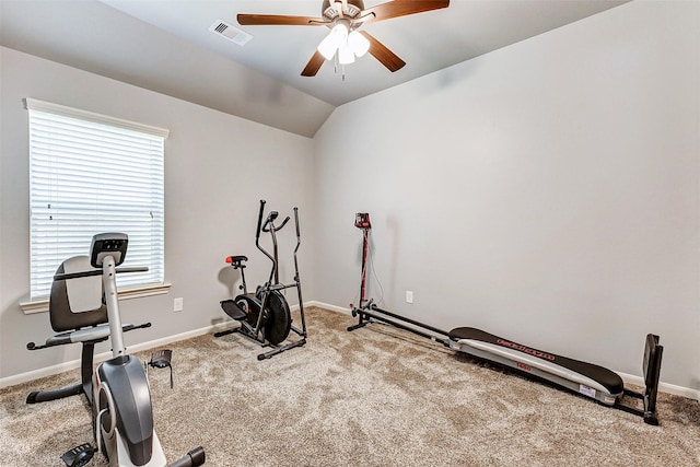 exercise area with visible vents, a ceiling fan, baseboards, carpet, and lofted ceiling