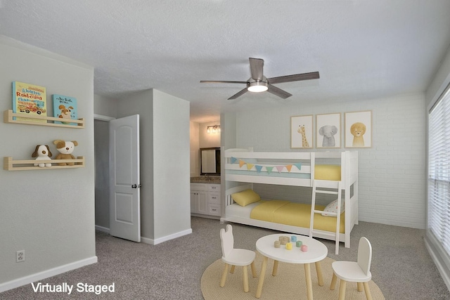 carpeted bedroom with baseboards