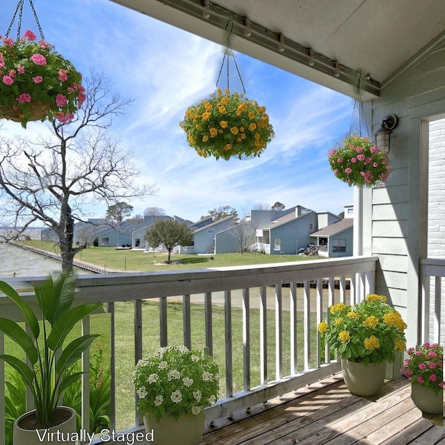 balcony featuring a residential view