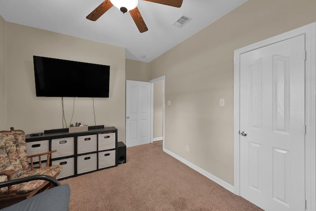 12638 Maxwell St, Willis, TX 77378 - living area featuring ceiling fan, carpet floors, and baseboards