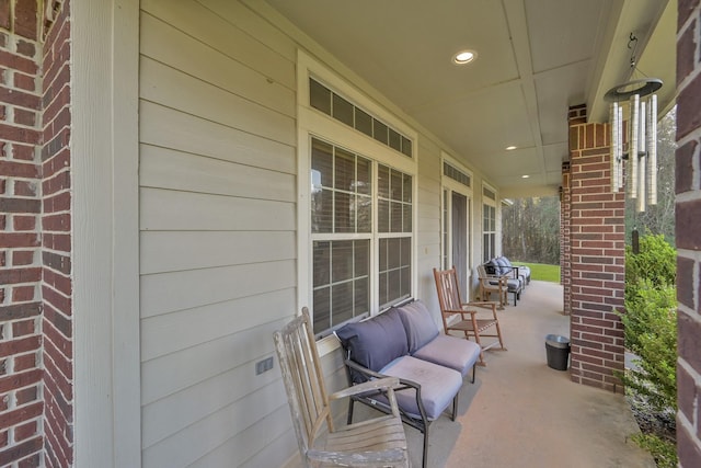 view of patio featuring a porch