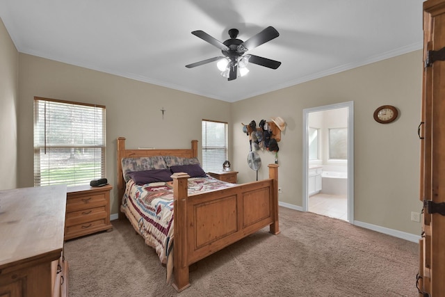 bedroom with a ceiling fan, connected bathroom, crown molding, baseboards, and light colored carpet