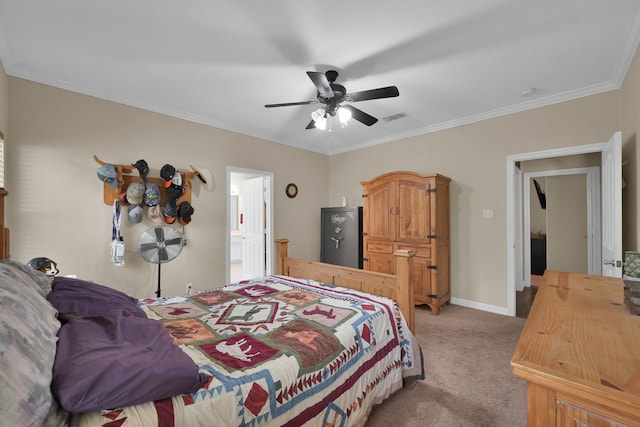 bedroom with visible vents, crown molding, baseboards, light colored carpet, and a ceiling fan