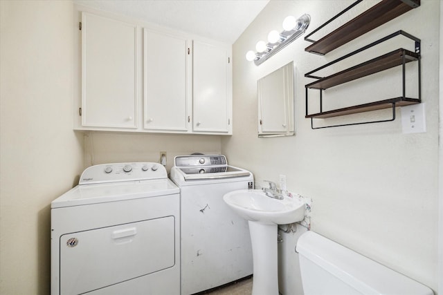 washroom featuring laundry area and washer and clothes dryer