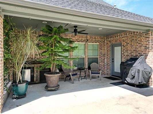 view of patio / terrace with grilling area and ceiling fan