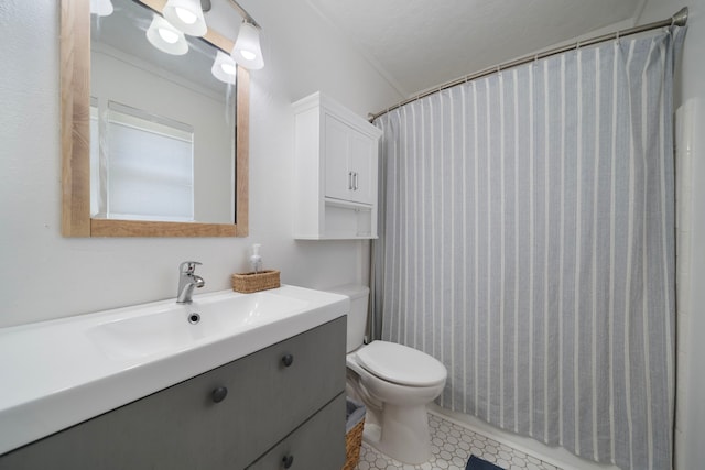 bathroom with a shower with curtain, toilet, and vanity