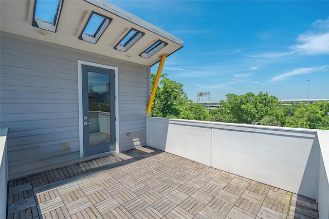 view of patio with a balcony